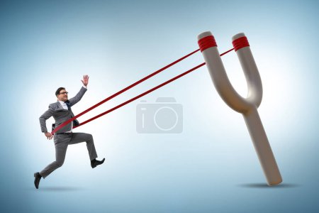 Photo for Businessman being launched from slingshot in the career concept - Royalty Free Image
