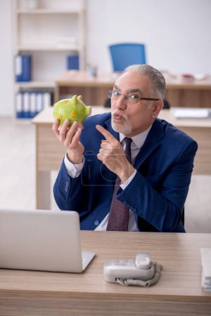 Photo for Old employee in planning retirement concept - Royalty Free Image