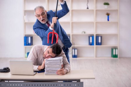 Photo for Old boss and young employee in bullying concept - Royalty Free Image