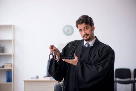 Photo for Young judge working in the courthouse - Royalty Free Image