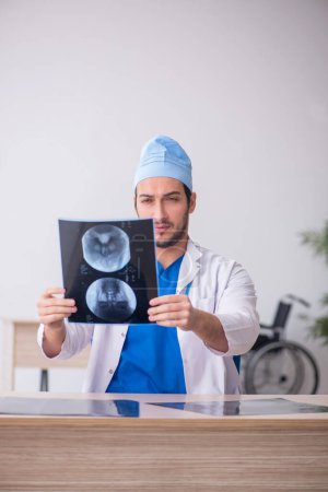 Photo for Young doctor radiologist working at the hospital - Royalty Free Image