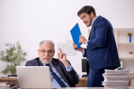 Photo for Two colleagues working in the office - Royalty Free Image