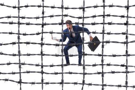 Photo for Businessman in the barbed wire concept - Royalty Free Image