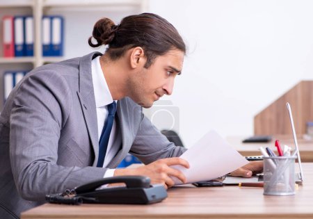 Photo for The unhappy male businessman in the office - Royalty Free Image