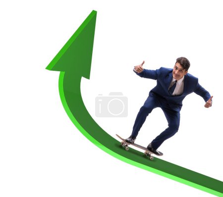 Photo for The businessman riding skateboard on financial graph - Royalty Free Image