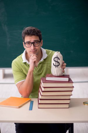 Photo for Young student in expensive education concept - Royalty Free Image