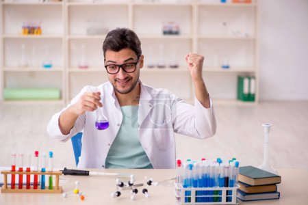 Photo for Young chemist working at the lab - Royalty Free Image