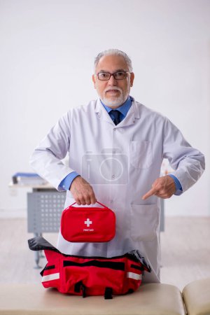 Photo for Aged male paramedic working at the hospital - Royalty Free Image