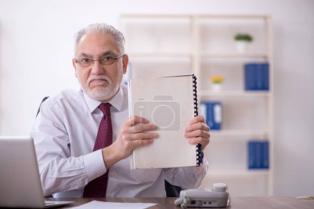 Photo for Old businessman employee and too much work in the office - Royalty Free Image