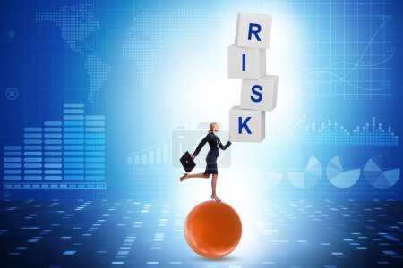 Foto de Risk management concept with the balancing businessman - Imagen libre de derechos