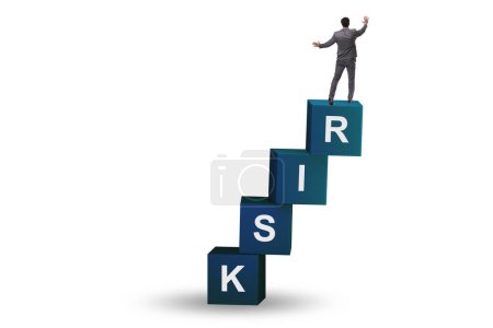 Foto de Risk management concept with businessman on the cubes - Imagen libre de derechos