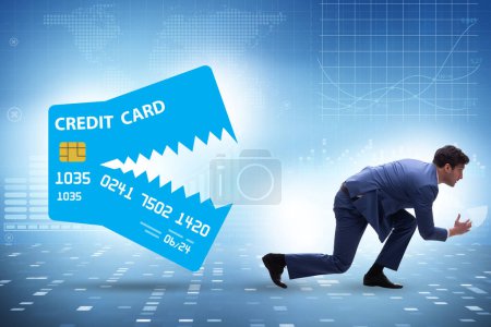 Foto de Businessman in the credit card debt concept - Imagen libre de derechos