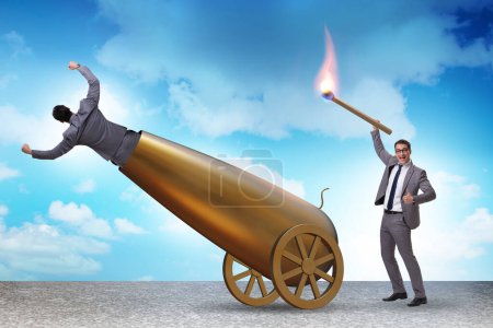 Photo for Concept of lay-off with the businessman and cannon - Royalty Free Image