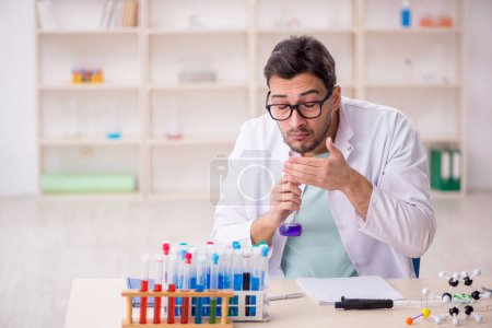 Photo for Young chemist working at the lab - Royalty Free Image