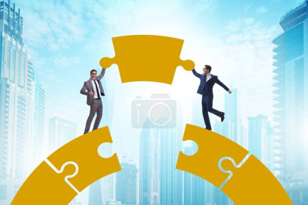 Photo for Business people building bridge in the teamwork concept - Royalty Free Image