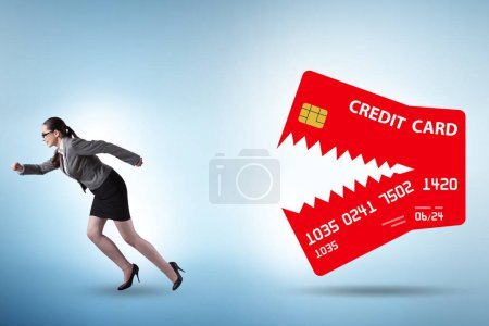 Photo for Businesswoman in the credit card debt concept - Royalty Free Image