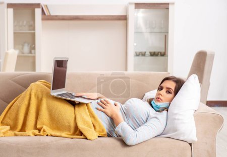 Photo for The sick pregnant woman suffering at home - Royalty Free Image