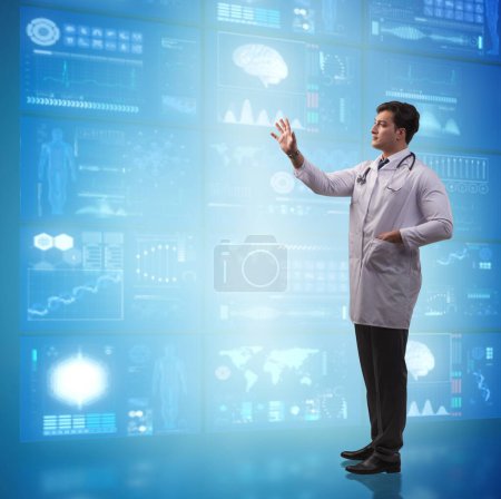 Photo for The doctor in telemedicine concept pressing buttons - Royalty Free Image