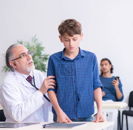 Photo for The young boy visiting doctor in hospital - Royalty Free Image