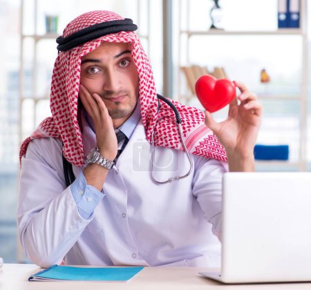 Photo for The arab doctor cardiologist working in the clinic - Royalty Free Image