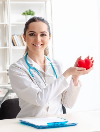 Photo for The young female doctor cardiologist working in the clinic - Royalty Free Image