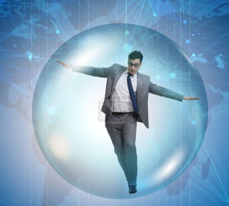 Foto de El hombre de negocios volando dentro de la burbuja - Imagen libre de derechos