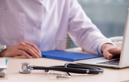 Photo for The young male doctor in telemedicine concept - Royalty Free Image