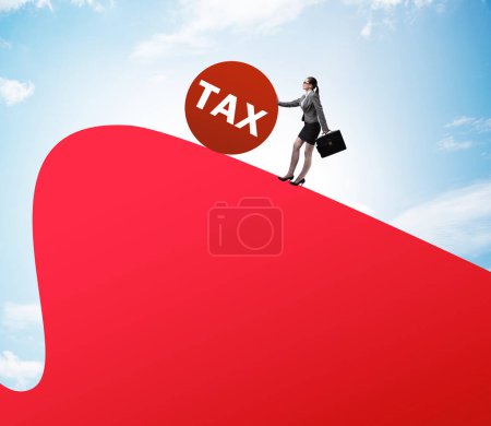 Photo for The businesswoman in tax concept on mountain - Royalty Free Image