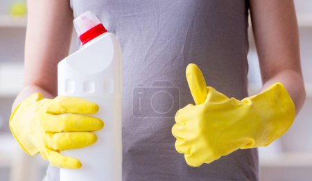 Photo for The woman doing cleaning at home - Royalty Free Image