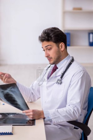 Photo for Young doctor radiologist working in the clinic - Royalty Free Image