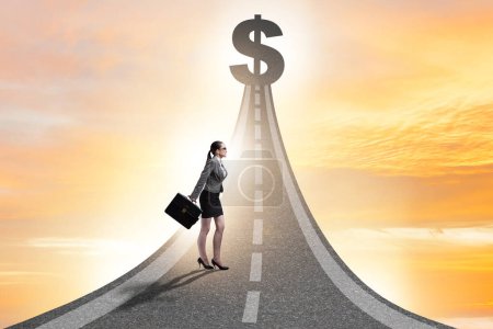 Photo for Businesswoman on the road to the wealth - Royalty Free Image