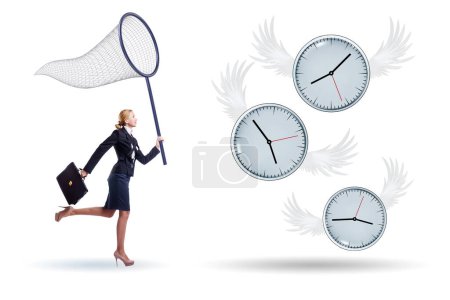 Photo for Deadline concept with the businesswoman catching clocks - Royalty Free Image