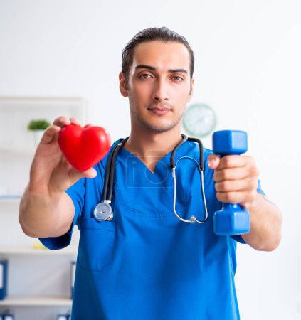 Photo for The young male doctor in sport and dieting concept - Royalty Free Image