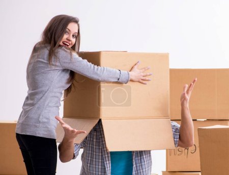 Photo for The young pair moving to new flat - Royalty Free Image