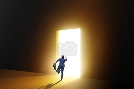 Photo for Businessman entering backlit door in the escape concept - Royalty Free Image