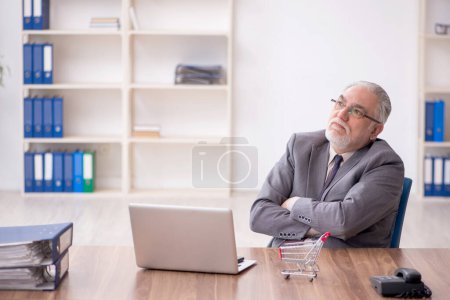 Photo for Old businessman employee in e-commerce concept - Royalty Free Image