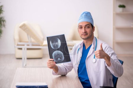Photo for Young doctor radiologist working at the hospital - Royalty Free Image