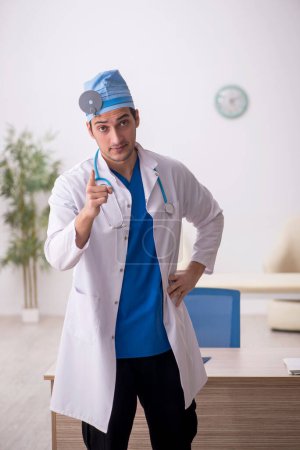 Photo for Young doctor otologist working at the hospital - Royalty Free Image