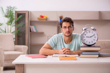 Photo for Young student preparing for exams at home - Royalty Free Image