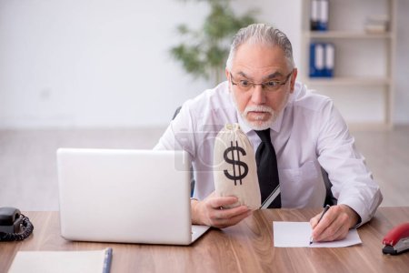 Photo for Old employee in remuneration concept - Royalty Free Image