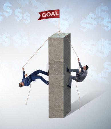 Foto de El concepto de competición con dos hombres de negocios escalando la torre - Imagen libre de derechos