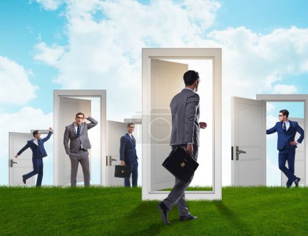 Photo for The businessman in uncertainty concept with many doors - Royalty Free Image