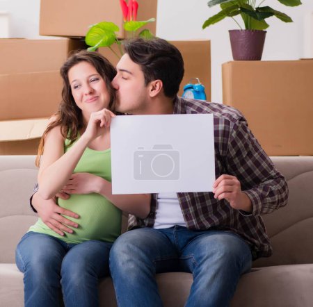 Photo for The young couple expecting baby with blank message - Royalty Free Image