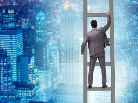 Photo for The young businessman climbing career ladder - Royalty Free Image
