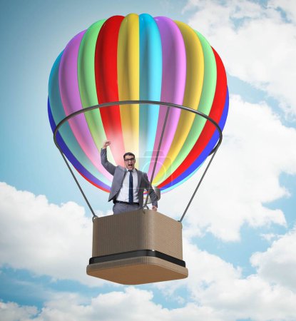 Téléchargez les photos : L'homme d'affaires volant sur ballon en défi concept - en image libre de droit