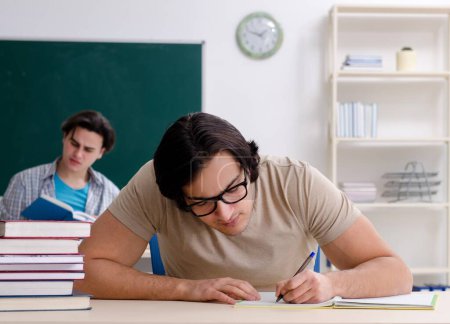 Photo for The two male students in the classroom - Royalty Free Image
