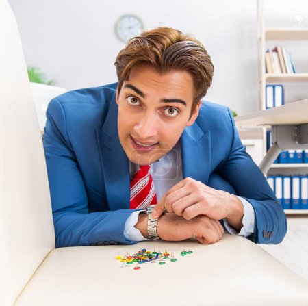 Photo for The office prank with sharp thumbtacks on chair - Royalty Free Image