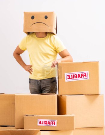 Photo for The unhappy man with box instead of his head - Royalty Free Image