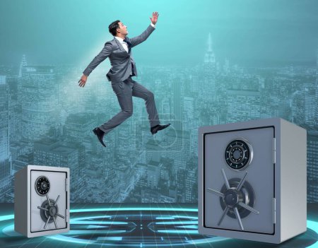 Photo for The businessman jumping from safes in business concept - Royalty Free Image