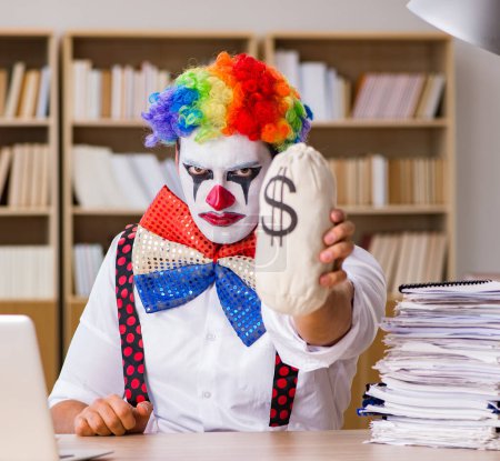 Photo for The clown businessman working in the office - Royalty Free Image